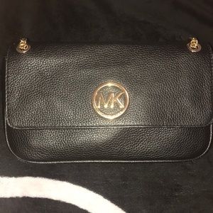 Black Michael Kors Handbag.